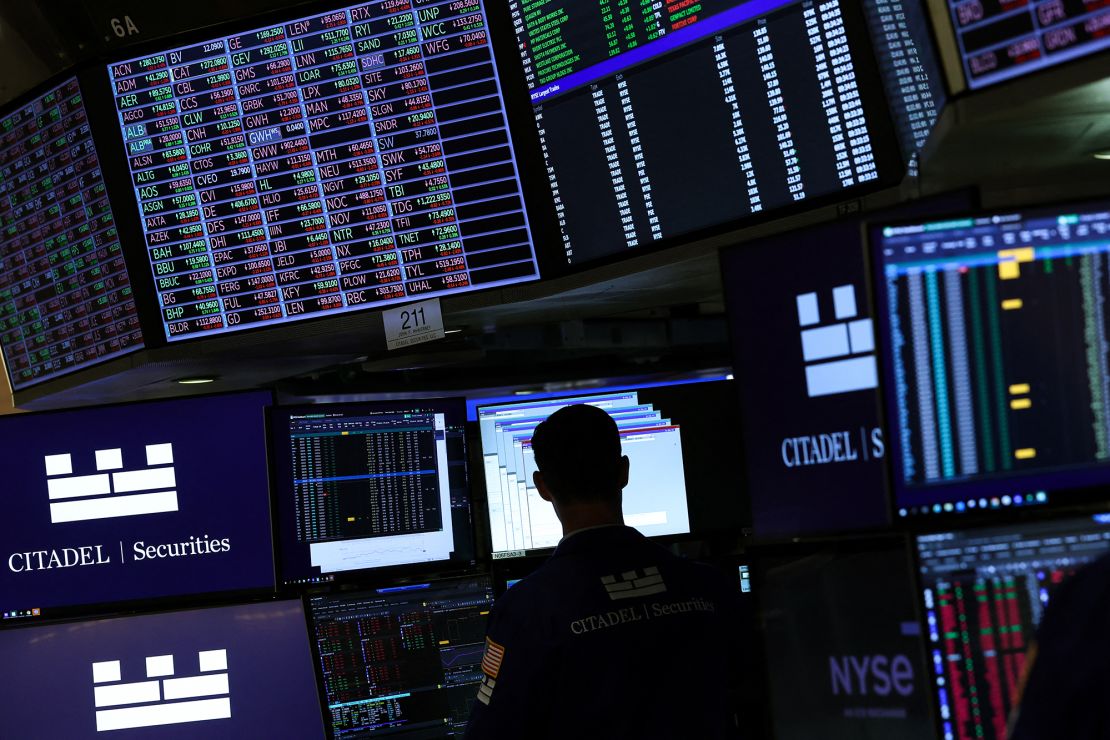 The traders work on the French Froncy exchange on Bell Bull on 9 April.