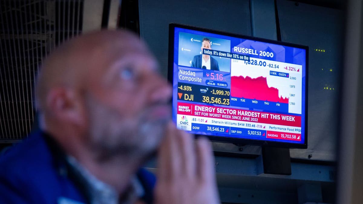 A man who seems to show television matters reporting news with stock market